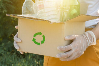 plastic bottles into a box for recycling concept