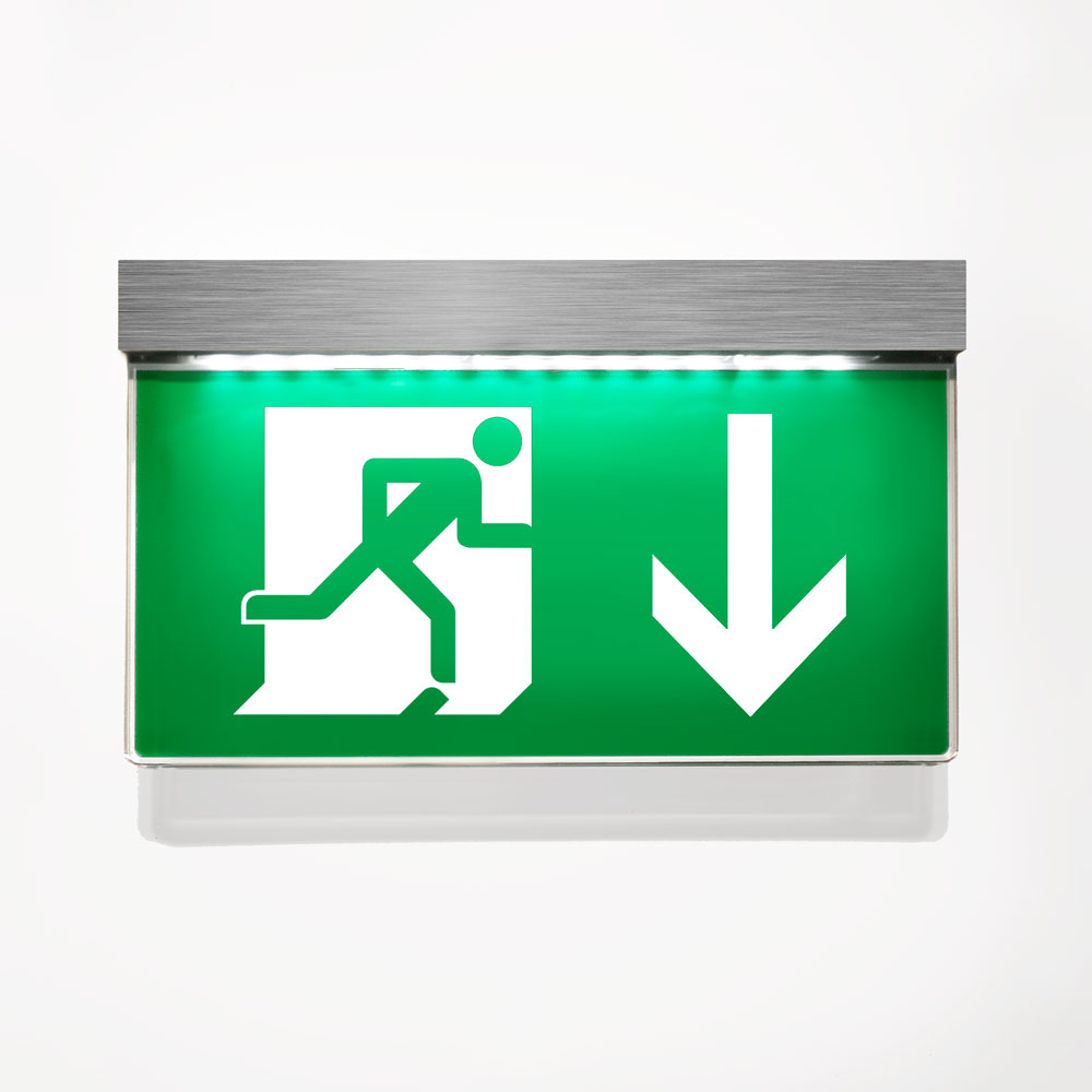 Porównanie starego czerwonego i nowego zielonego znaku ewakuacyjnego obok siebie